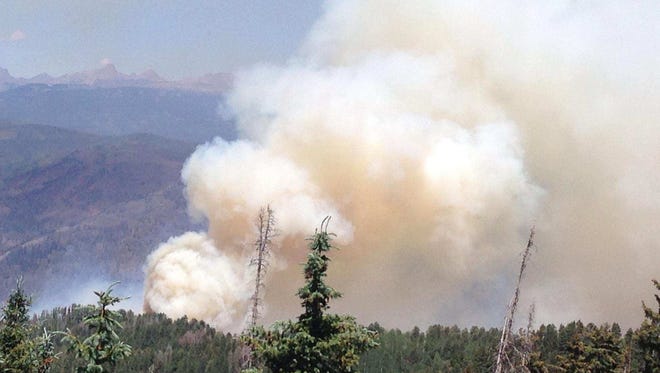 Smoke from intensified fire activity in the Clear Creek Area was documented by the 416 Fire crew around 3:15 p.m. June 24, 2018, near Durango, Colorado.