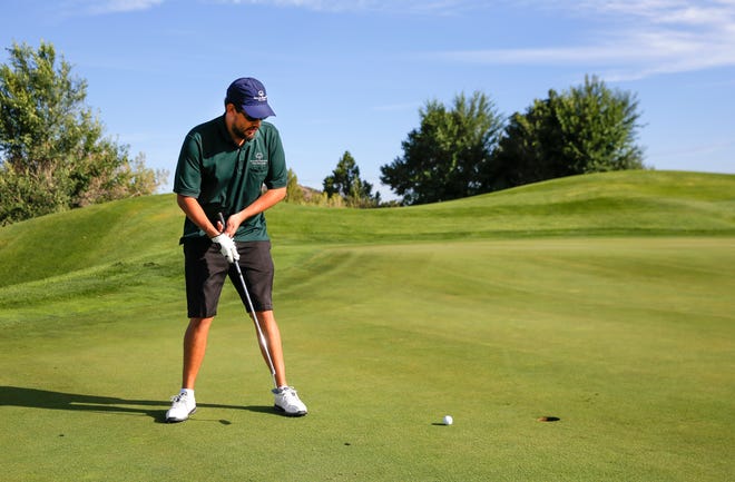 Athlete Nick Sylvester putts Friday, Aug. 24, 2018, during the Four Corners Invitational at the Pinon Hills Golf Course in Farmington. The course is among public facilities the City of Farmington will reopen on Dec. 2 with COVID-19 restrictions in place.