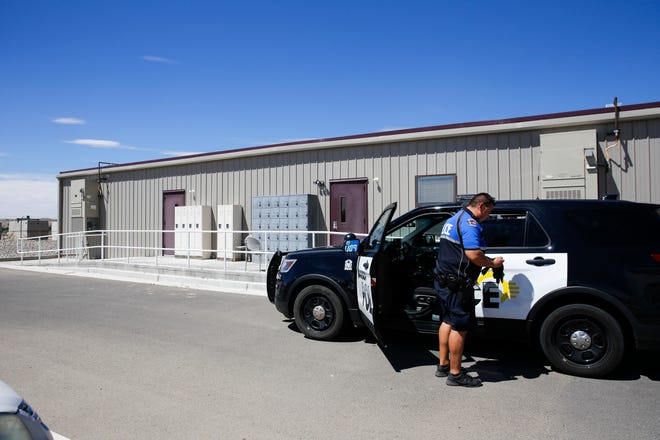Kris Chavez, a district coordinator officer with Farmington Police Department drops off an inebriated subject, Thursday, Aug. 30, 2018 at the Sobering Center in Farmington.