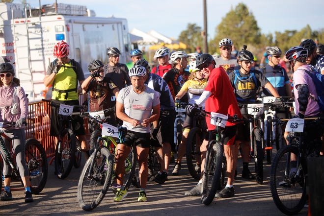 Short-course race competitors line up at the starting line at the 38th annual Road Apple Rally Saturday at Lions Wilderness Park in Farmington.