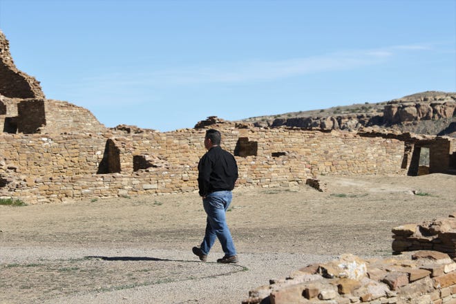 U.S. Rep. Ben Ray Lujan, D-NM, walks through Pueblo Bonito, Sunday, April 14, 2019, during a tour of Chaco Culture National Historical Park.