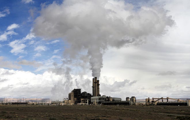 The San Juan Generating Station is pictured, Monday, Sept. 29, 2014,  in Waterflow.