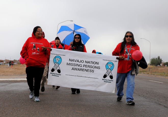 Participants begin a walk to raise awareness about missing and murdered Indigenous women and girls. The May 23, 2019 walk proceeded from the Northern Navajo Medical Center to the Navajo Nation Shopping Center in Shiprock.