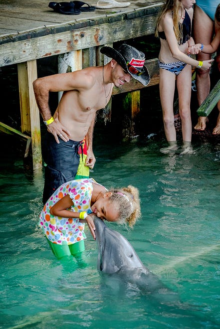 With all those attractions already covered as part of your resort stay, it can be tempting never to wander outside the walls, especially with a family in tow. But if you don ' t, you ' ll be missing out on experiences like getting up close and personal with a dolphin, which you can do at Dolphin Cove.