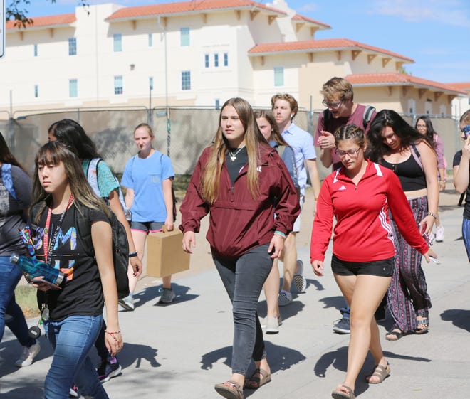 New Mexico State University students walk between classes Wednesday, Sept. 18, 2019. On Wednesday, New Mexico Gov. Michelle Lujan Grisham proposed New Mexico residents receive free education at state-funded institutions of higher learning.