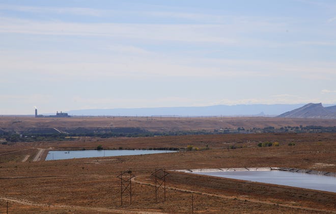 Four Corners Power Plant can be seen from the San Juan Generating Station.