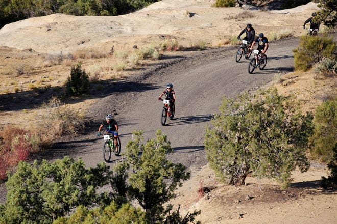 A group of riders navigate the 15-mile course, Saturday, Oct. 5, 2019, shortly after the start of the Road Apple Rally.