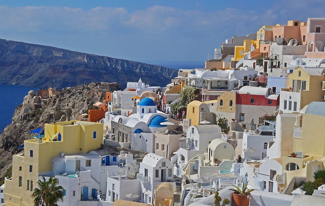 Santorini, Greece Best time to fly: September If you don ’ t mind the 50-degree weather, travel to Santorini in September when airfares are an absolute steal. A round trip to iconic views of turquoise waves and bright white Cycladic houses among the cliffs hovers at around $825.