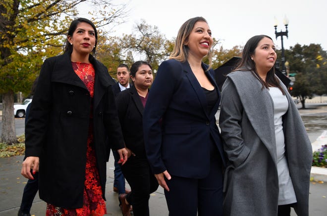 Eliana Fernandez, center, with other DACA recipients heads into hear arguments before the U.S. Supreme Court on whether the 2017 Trump administration decision to end the Deferred Action for Childhood Arrivals program (DACA) is lawful on Nov. 12, 2019.