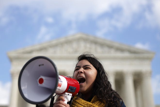 DACA student Anahi Figueroa Flores, who attends Georgetown University, speaks during a rally defending Deferred Action for Childhood Arrivals (DACA) in front of the U.S. Supreme Court after they walked out from area high schools and universities Nov. 8, 2019, in Washington. The Supreme Court will hear oral arguments on President Donald Trump's decision of ending the DACA program on Nov. 12 2019.