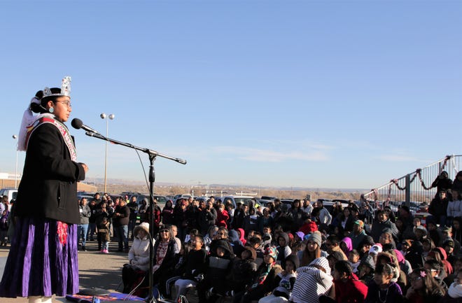 Miss Northern Navajo 2019-2020 Tyuilera Toney speaks to a crowd of local elementary school students brought out to see the U.S. Capitol Christmas tree in the parking lot of Shiprock High School in Shiprock on Nov. 13, 2019.