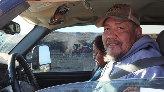 Navajo Nation member Samuel Bedah waits to receive free coal for home heating at Navajo Mine in Fruitland on Feb. 6, 2020.