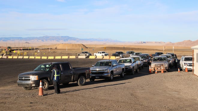 Navajo Nation members from across New Mexico and Arizona wait for free coal distribution at Navajo Mine in Fruitland on Feb. 6, 2020.