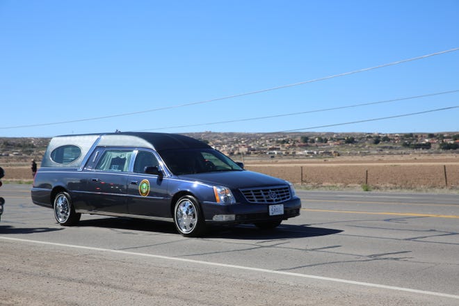Las Cruces fallen soldier Sergeant First Class Antonio Rey Rodriguez ' s motorcade drives by Fairacres Elementary School on Picacho Hills on Tuesday, Feb. 18, 2020. Rodriguez was a former student at the elementary school.
