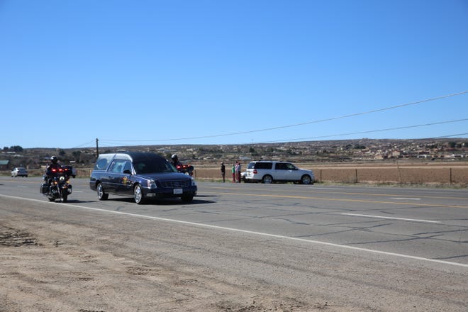 Las Cruces fallen soldier Sergeant First Class Antonio Rey Rodriguez ' s motorcade drives by Faireacres Elementary School on Picacho Hills on Tuesday, Feb. 18, 2020. Rodriguez was a former student at the elementary school.