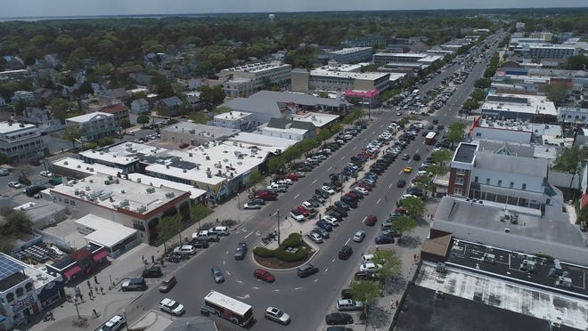 Cars line the streets at Delaware ' s Rehoboth Beach on Saturday, May 16, 2020.