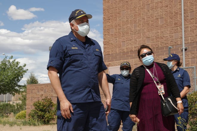 Indian Health Service Director Read Adm. Michael Weahkee, center, and Navajo Area IHS Director Roselyn Tso visited on May 27 the alternate care site at Northwest High School in Shiprock. The site was set up in response to the coronavirus pandemic.
