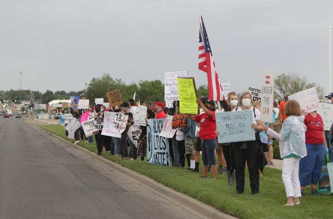 Dozens participant in a peaceful protest for Black Lives Matter in front of the Farmington Museum at Gateway Park on June 5 in Farmington.