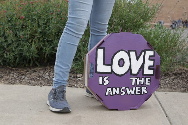 A message of love was among dozens displayed at a demonstration that showed solidarity with the Black Lives Matter movement in front of the Farmington Museum at Gateway Park on June 5 in Farmington.