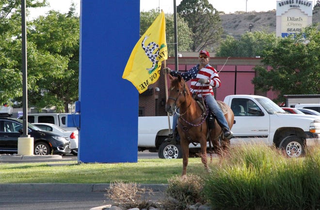 Rocco Dipaolo rides Bonita, Friday, June 19, 2020, during a rally showing support for law enforcement in Farmington.