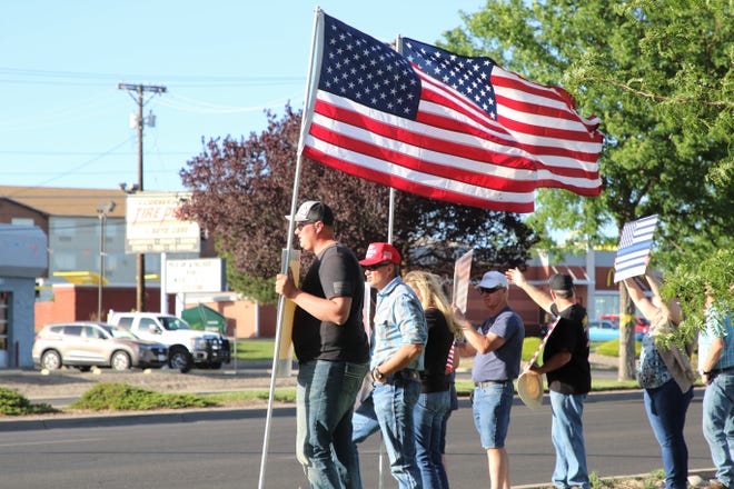 Locals gather for a "Back the Blue" law enforcement rally on Friday, June 19, 2020, at the Animas Valley Mall in Farmington.