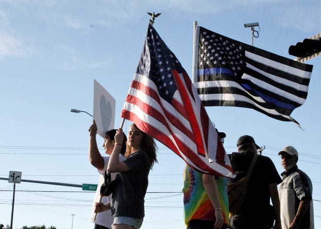 Protesters showed their support for law enforcement, Friday, June 19, 2020, during a rally at Animas Valley Mall.