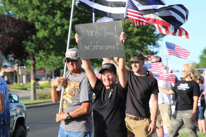 Locals gather for a "Back the Blue" law enforcement rally on Friday, June 19, 2020, at the Animas Valley Mall in Farmington.