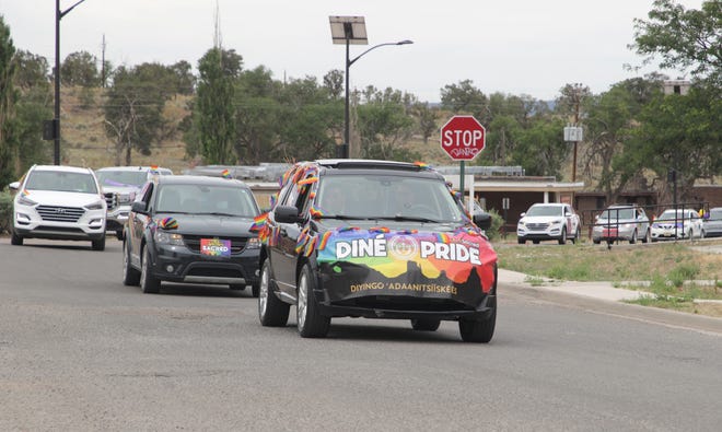 The Diné Pride Cruise proceeds on Window Rock Boulevard toward the Navajo Nation Council chamber on June 26 in Window Rock, Arizona.
