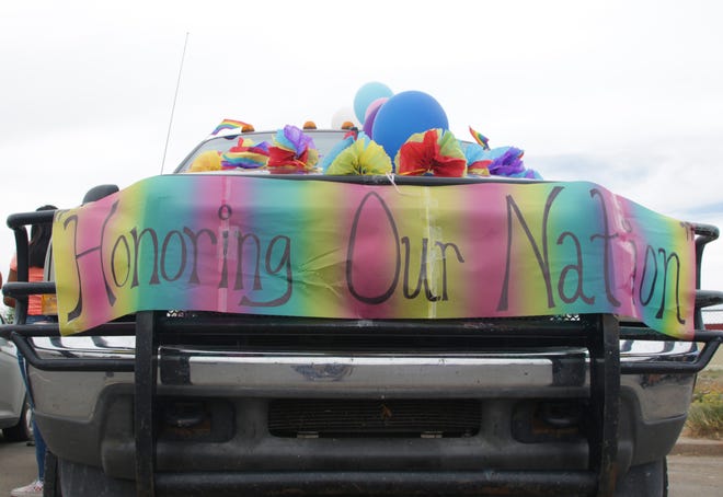 A message is displayed during the Diné Pride Cruise on June 26 in Window Rock, Arizona.