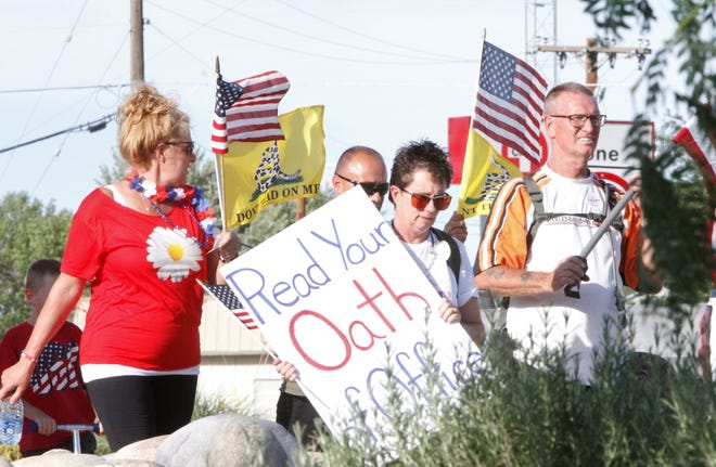 Participants in the Freedom March are seen, Saturday, July 11, 2020, in Farmington.