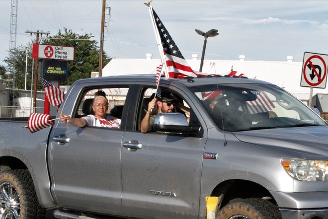 A truck participates in the Freedom March, Saturday, July 11, 2020, in Farmington.