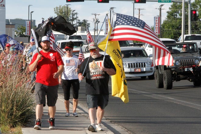 The Freedom March heads down East Main Street, Saturday, July 11, 2020, toward the Farmington Museum at Gateway Park.