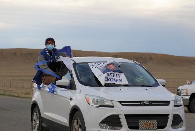Northwest High School graduate Devin Brown participates in a no contact parade on July 17 in Sanostee. The parade was organized by Tsé Alnaozt'i'í Chapter officials and the chapter's emergency response team to recognize students from the community who graduated or were promoted to kindergarten and high school.