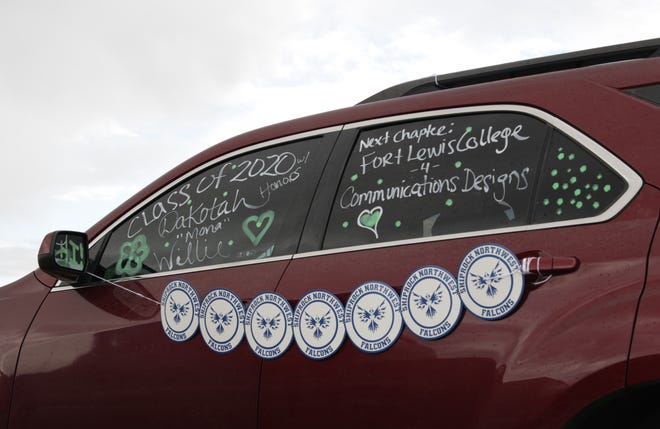 A vehicle is decorated to honor a graduate from Northwest High School in Shiprock. Tsé Alnaozt'i'í Chapter officials and the chapter's emergency response team recognized graduates from the Sanostee community on July 17.