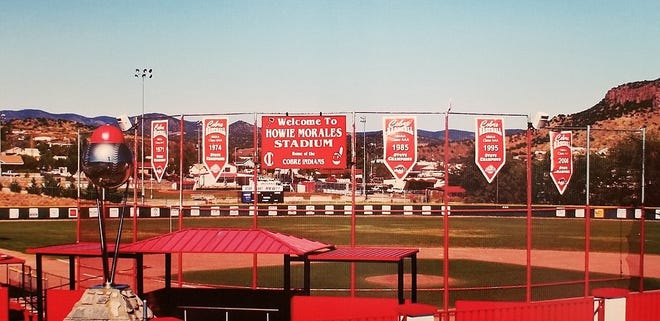 Howie Morales Stadium at Rominger Field in Bayard NM is the home ball park for the Cobre High Indians baseball teams. The bottom-right of the signage has the cartoon mascot of Chief Wahoo.