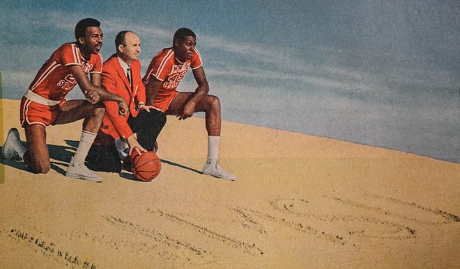 (Left to right) Jimmy Collins, New Mexico State head coach Lou Henson and Sam Lacey pose for a photo during the 1969-1970 season.