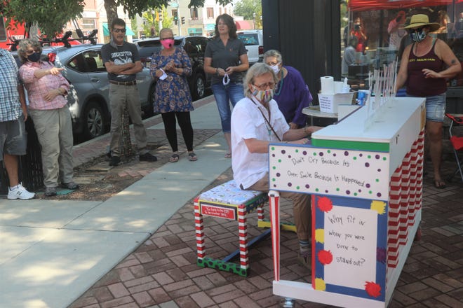 Hoyle Osborne plays a ragtime tune in Aztec's Main Avenue Plaza on Aug. 15, 2020, during the introductory event for the town's Painted Pianos -- Big Sound in a Small Town project.