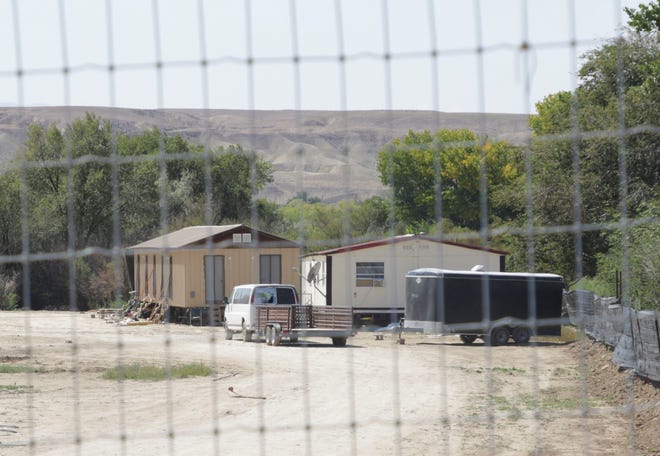 Mobile homes sit at a hemp farm location on Mesa Farm Road in Shiprock on Sept. 23.