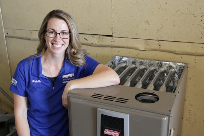 Michelle Robbins of Robbins Heating & Air Conditioning Inc. says her company will be donating and installing a Coleman furnace for a needy family this fall for the second year in a row.