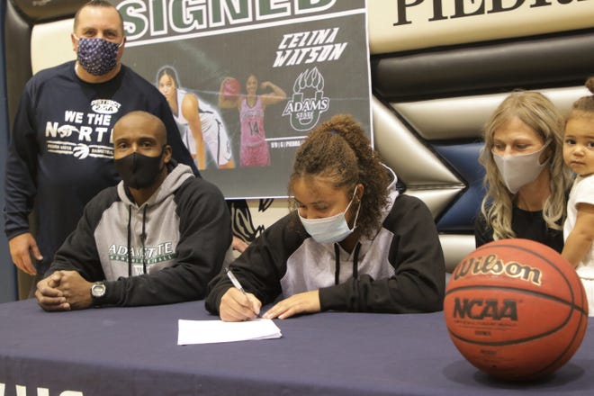 Piedra Vista's Celina Watson officially signs her National Letter of Intent on Wednesday, Nov. 11, 2020 to continue her basketball career at NCAA Division II Adams State University.