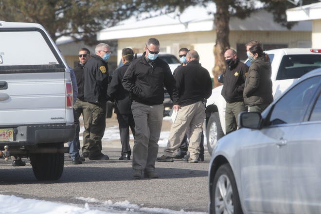 Area law enforcement officers respond to an officer-involved shooting on the morning of Jan. 20 in the 1000 block of Glade Lane. A suspect was transported to the hospital with injuries.