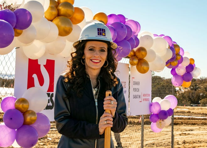 San Juan College President Toni Hopper Pendergrass is all smiles as she takes part in a groundbreaking ceremony for the school's new student housing project on Feb. 19, 2021, on the college campus in Farmington.