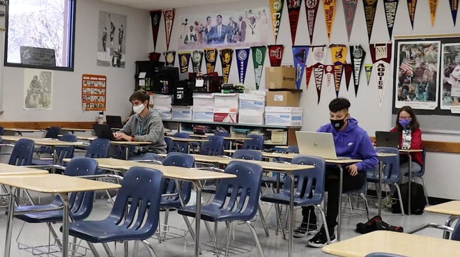 In this clip from a video, students sit socially distanced in an Oñate High School classroom on their first day of hybrid learning on Feb. 22, 2021.
