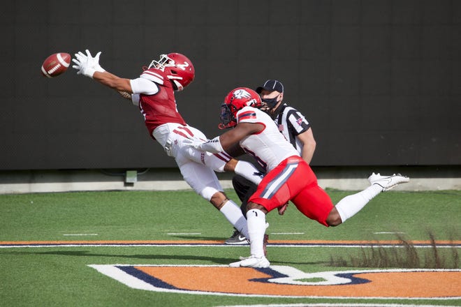Isaiah Garcia-Castaneda (2) dives for a pass as New Mexico State takes on Dixie State at the Sun Bowl in El Paso, Texas on Sunday, March 7, 2021.