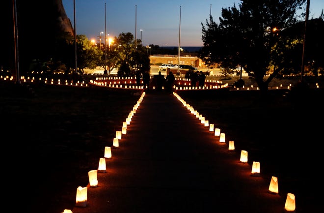 Luminarias light the Veterans Memorial Park on March 17 in Window Rock, Arizona during a remembrance event to recognize tribal members who died of COVID-19.