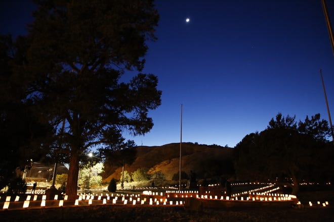Navajo Nation government employees and volunteers situated 1,222 luminarias on March 17 at Veterans Memorial Park in Window Rock, Arizona to remember each tribal member who died of COVID-19.