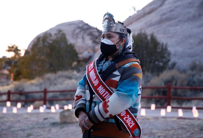Miss Navajo Nation Shaandiin Parrish listens to remarks during an March 17 event in Window Rock, Arizona to remember members of the Navajo Nation who died of COVID-19.