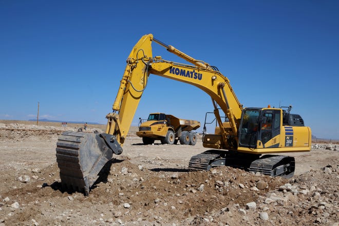 An excavator works at a construction area of the Navajo-Gallup Water Supply Project on April 15 in Newcomb.