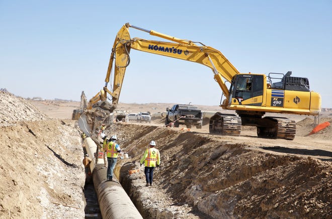 Construction of the Navajo-Gallup Water Supply Project proceeds on April 15 in Newcomb.
