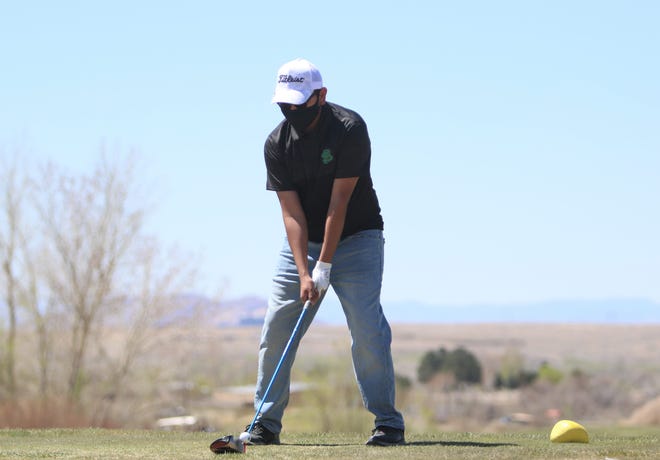 Farmington's Steven Ben prepares to hit the ball from the 10th tee box during the Aztec Invitational on Monday, April 19, 2021, at Riverview Golf Course in Kirtland.